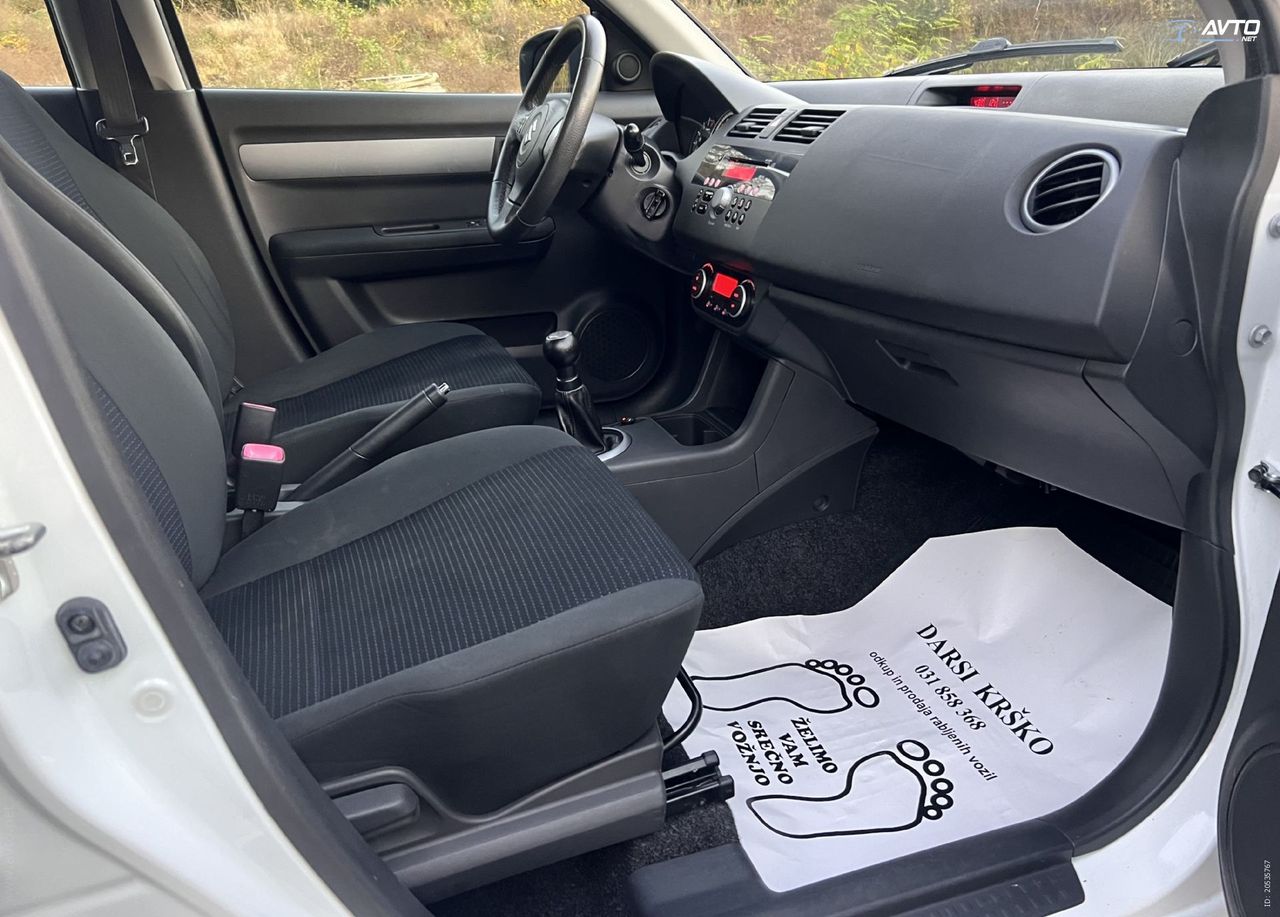 Zunanja slika - Suzuki Swift - 1.3 DELUXE DIG.KLIMA PERLA BELA SLOVENSKI ALU15 - 13