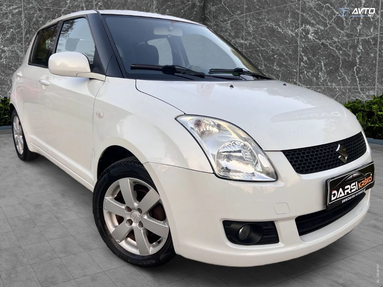 Zunanja slika - Suzuki Swift - 1.3 DELUXE DIG.KLIMA PERLA BELA SLOVENSKI ALU15 - 12