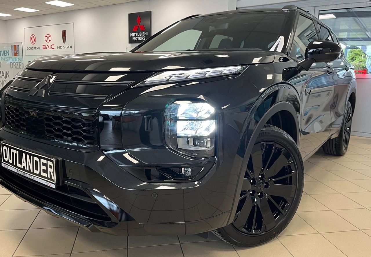 Zunanja slika - Mitsubishi Outlander - Black Edition PHEV 4WD 2.4  Avt. - NA ZALOGI - - 3