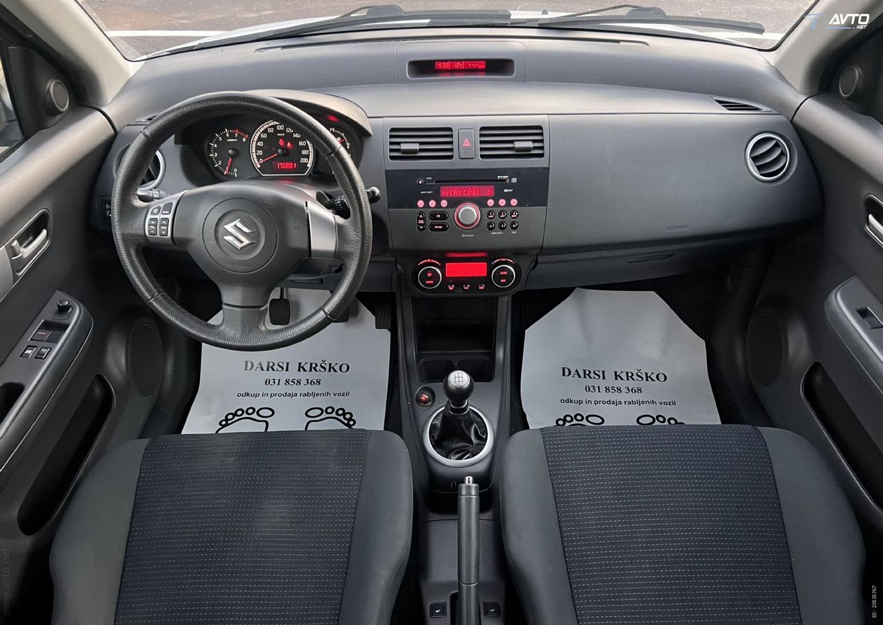 Zunanja slika - Suzuki Swift - 1.3 DELUXE DIG.KLIMA PERLA BELA SLOVENSKI ALU15 - 6