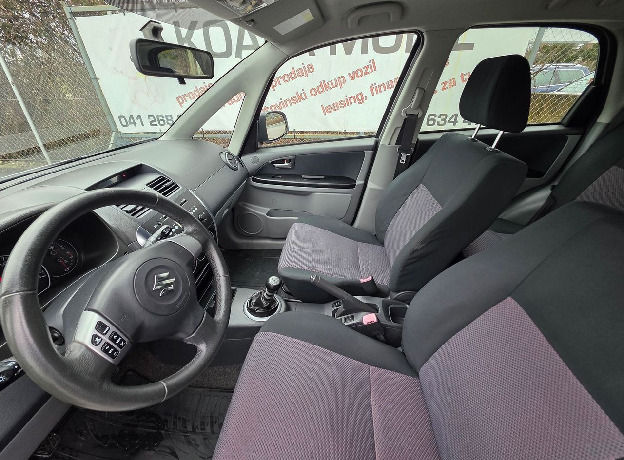 Zunanja slika - Suzuki SX4 - 1.9 TD COMFORT+ 4X4 ABS.KLIMA.CD  LEPO OHRANJEN - 9