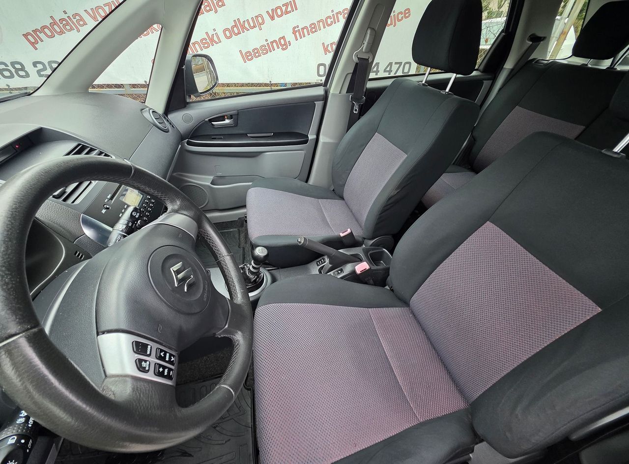 Zunanja slika - Suzuki SX4 - 1.9 TD COMFORT+ 4X4 ABS.KLIMA.CD  LEPO OHRANJEN - 11