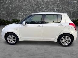 Zunanja slika - Suzuki Swift - 1.3 DELUXE DIG.KLIMA PERLA BELA SLOVENSKI ALU15 - 9 - Predogledna slika