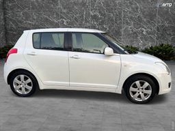 Zunanja slika - Suzuki Swift - 1.3 DELUXE DIG.KLIMA PERLA BELA SLOVENSKI ALU15 - 10 - Predogledna slika