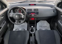 Zunanja slika - Suzuki Swift - 1.3 DELUXE DIG.KLIMA PERLA BELA SLOVENSKI ALU15 - 1 - Predogledna slika