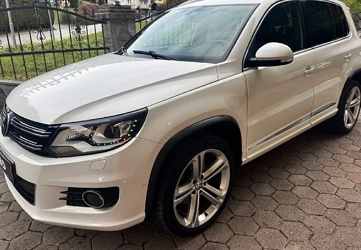 Zunanja slika - Volkswagen Tiguan - 2.0 TDI 4X4 DSG R-LINE 1.LASTNIK ALU18 XENON LED - 1
