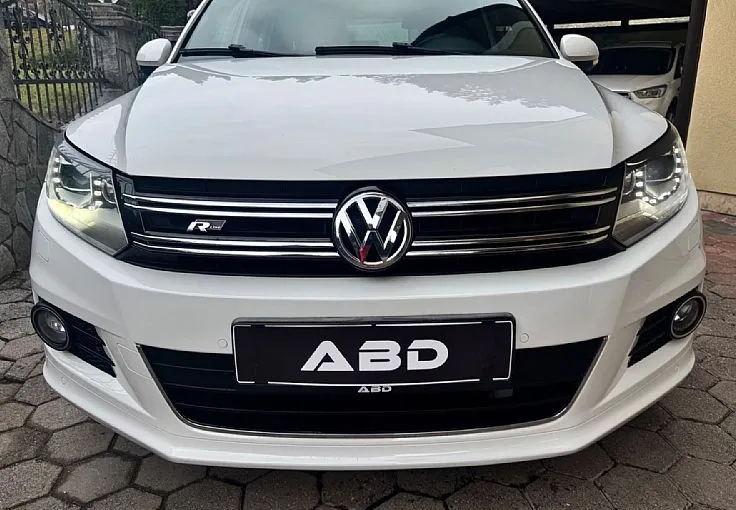 Zunanja slika - Volkswagen Tiguan - 2.0 TDI 4X4 DSG R-LINE 1.LASTNIK ALU18 XENON LED - 2