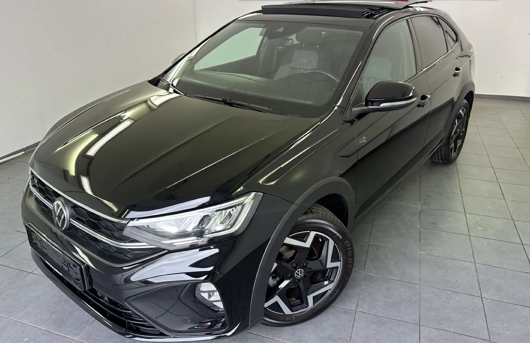 Zunanja slika - Volkswagen Taigo - 1.0 TSI R-Line 85.PANORAMA.LED.2025.SAMO 22.000 KM - 1