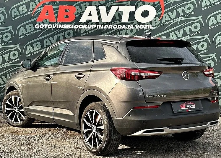 Zunanja slika - Opel Grandland X - 1.2 TURBO 96KW+SLO+1LASTNIK+VELIKSERVIS+UGODNO+TOP - 7