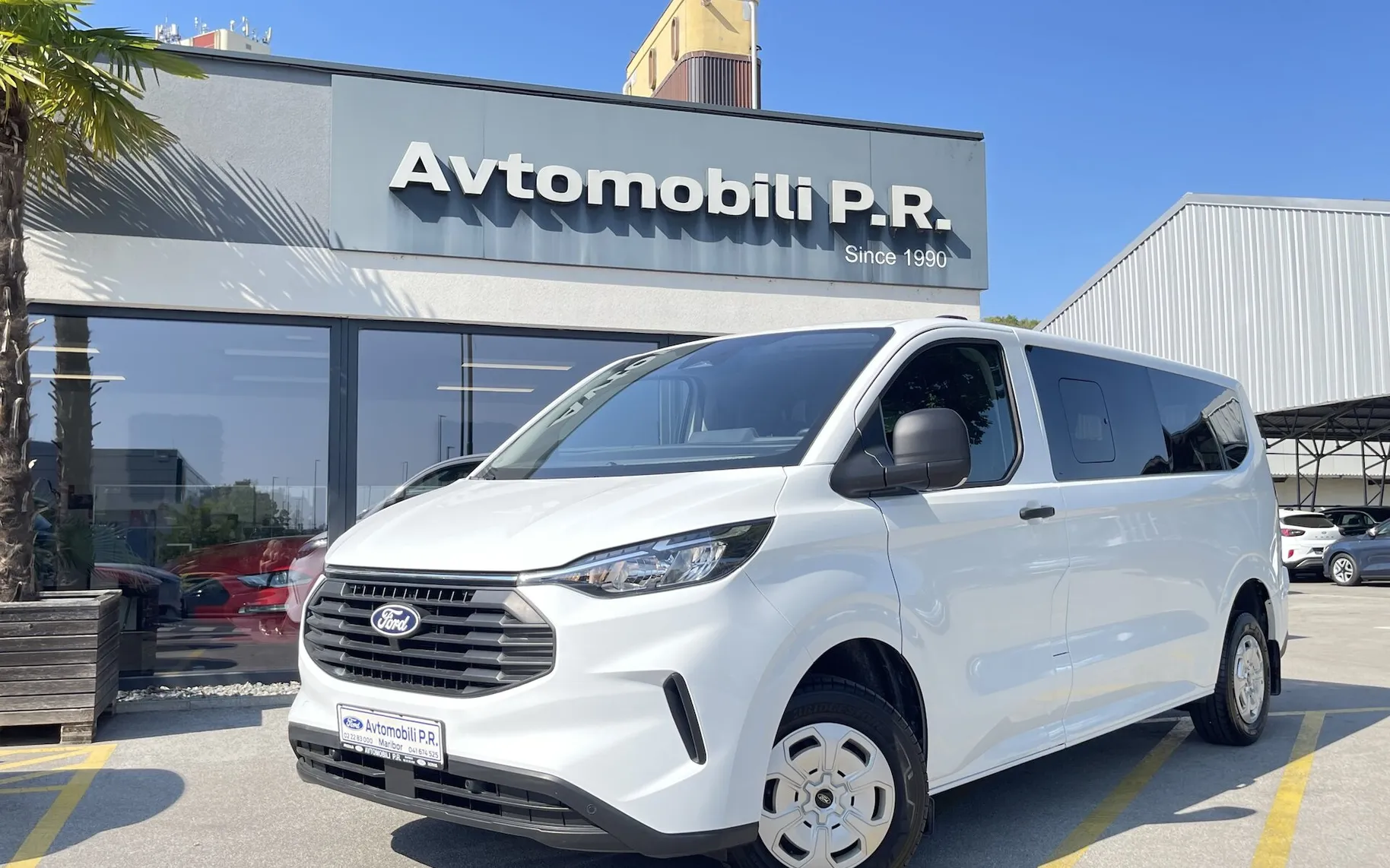 Zunanja slika - Ford Transit Custom - Kombi 320 2.0 TDCi L2H1  DMR  TREND 9 SEDEŽEV SLO - 1