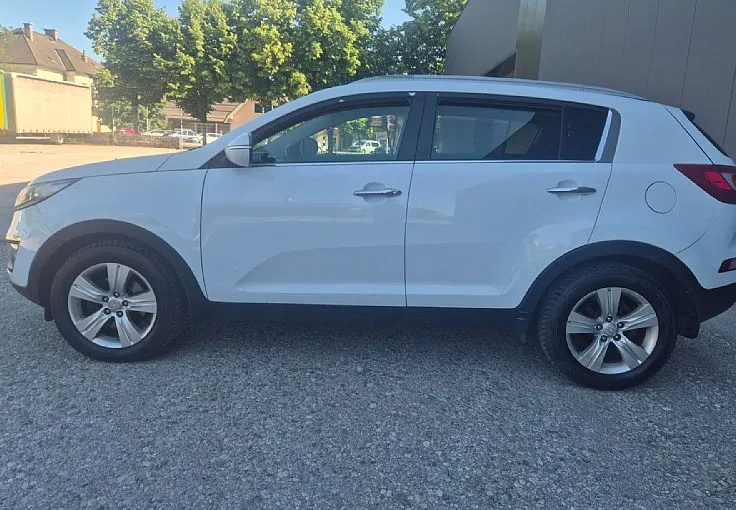 Zunanja slika - KIA Sportage - 1.7 CRDi + BREZ POLOGA TUDI ZA TUJCE - 8