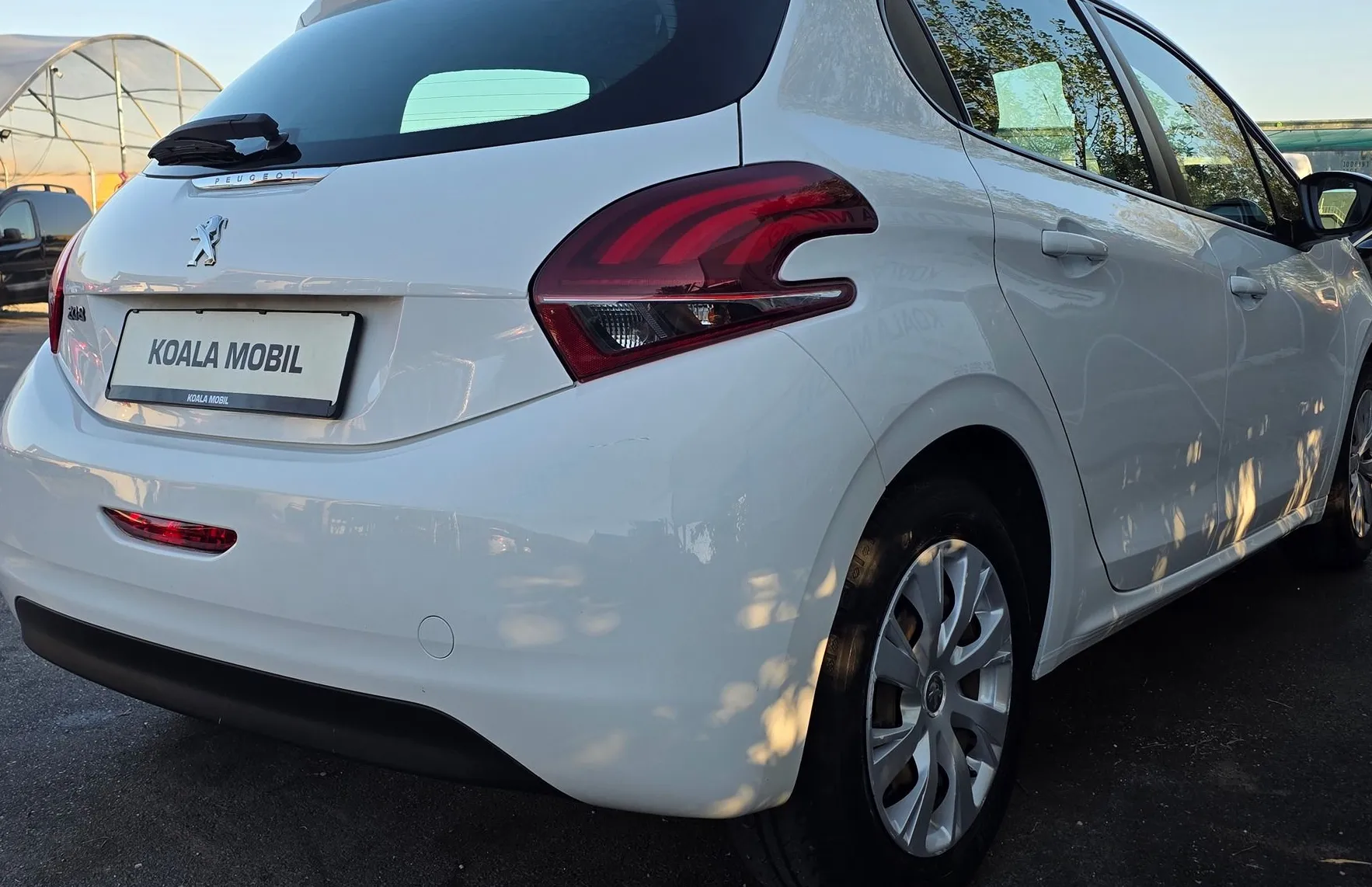 Zunanja slika - Peugeot 208 - 1.2 PURETECH 82 ZASLON-KLIMA-SLOVENSKI-1.LASTNIK - 4