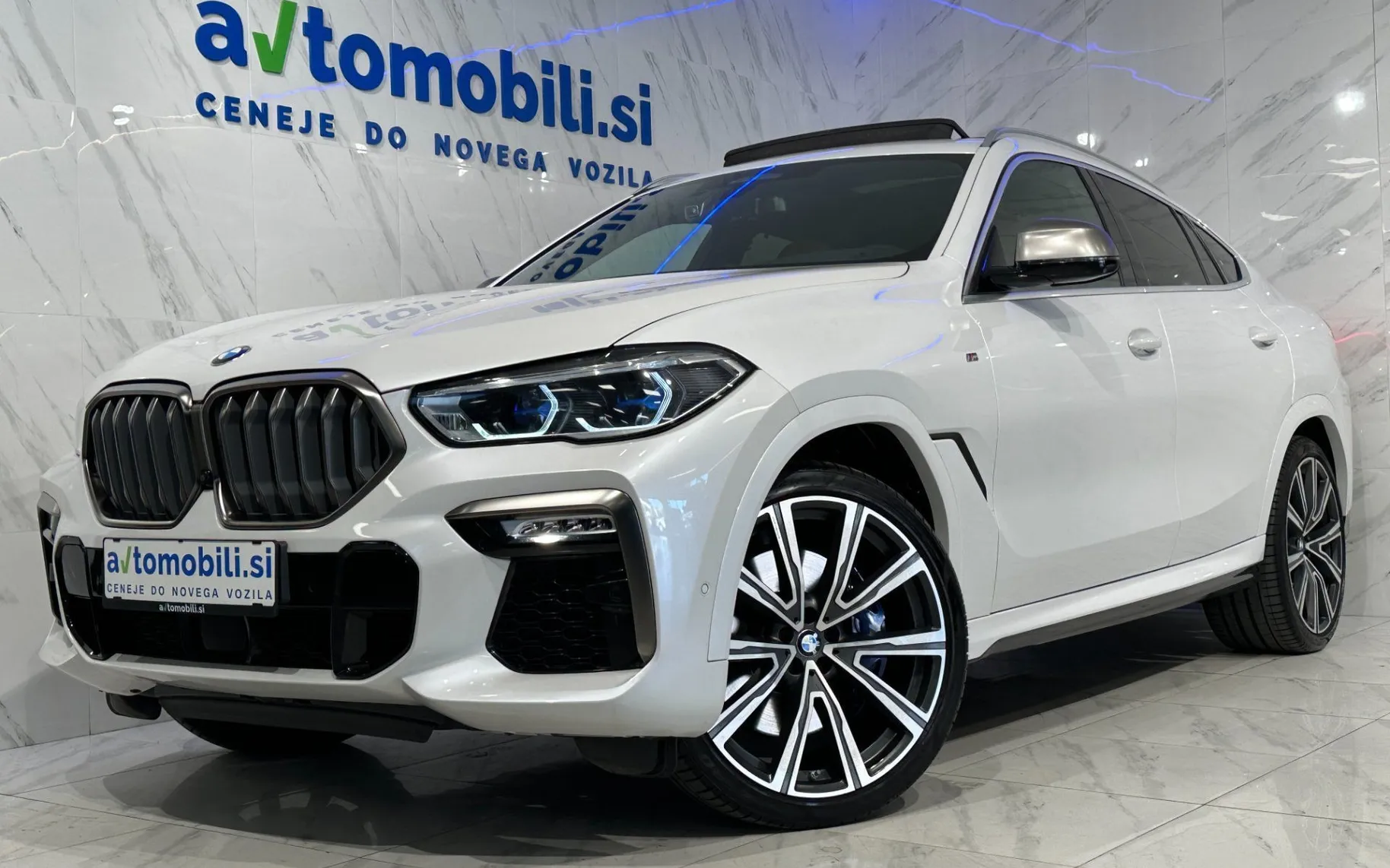 Zunanja slika - BMW serija X6: - M50i|xD|SkyL|SoftC|R22|Kljuka|BowersW|ACC|HUD|360K - 1
