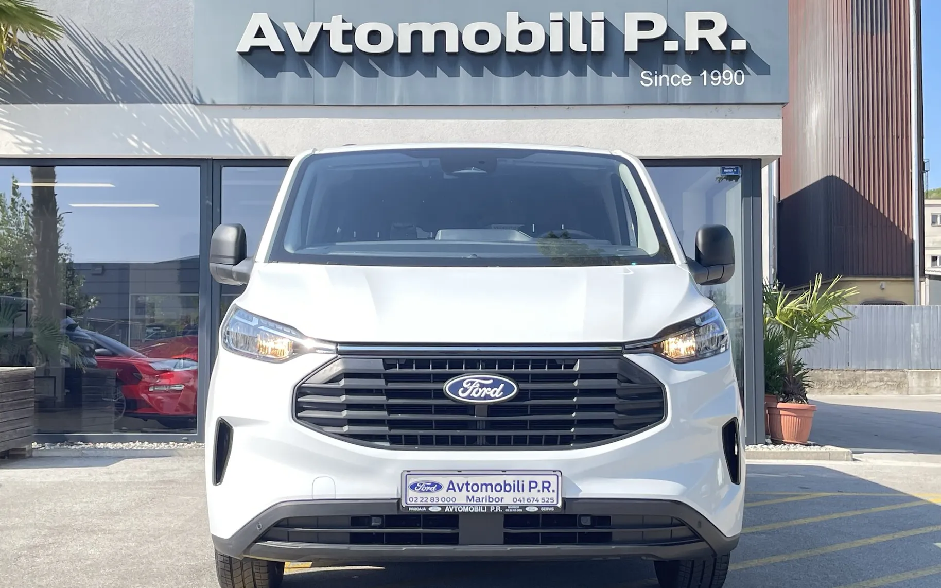 Zunanja slika - Ford Transit Custom - Kombi 320 2.0 TDCi L2H1  DMR  TREND 9 SEDEŽEV SLO - 2