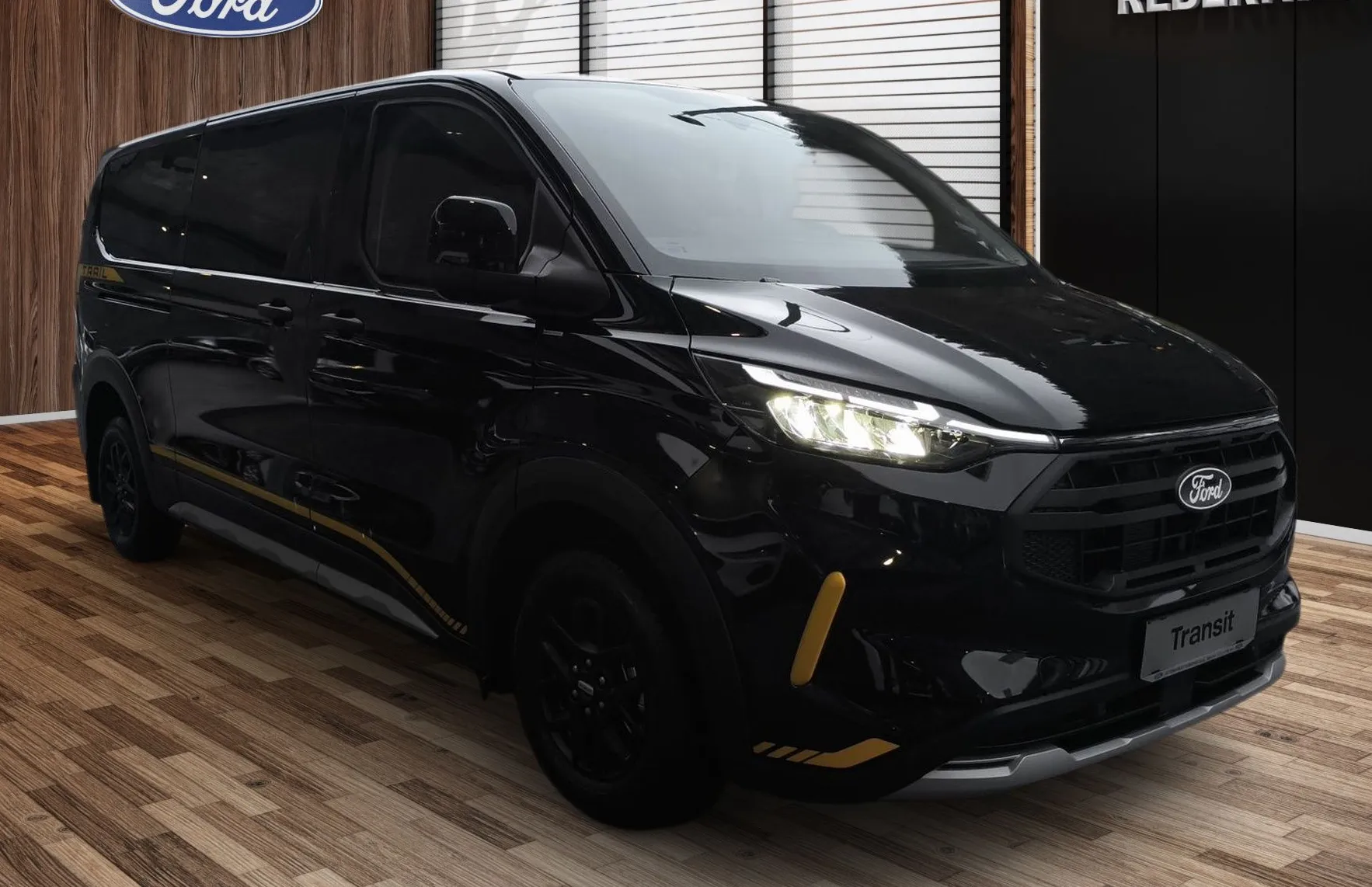 Zunanja slika - Ford E-Transit Custom - Transit Custom KOMBI TRAIL 2.0 TDCi 150 KM M6 L2H1-8.SED.- ZALOGA - 2