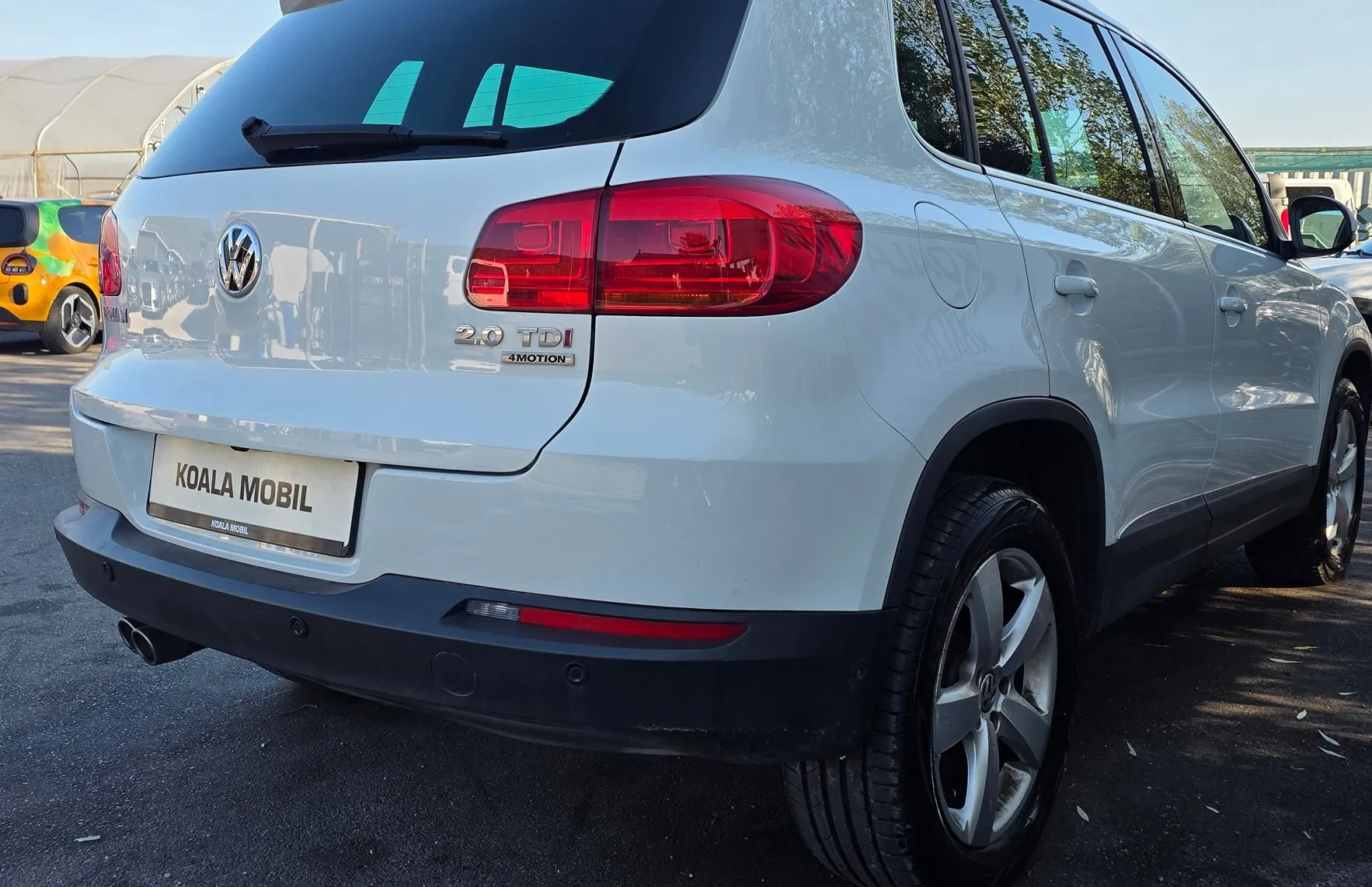 Zunanja slika - Volkswagen Tiguan - 2.0TDI 4MOTION BI-XENON-NAVI-ALU-KEYLESS-1.LASTNIK - 4