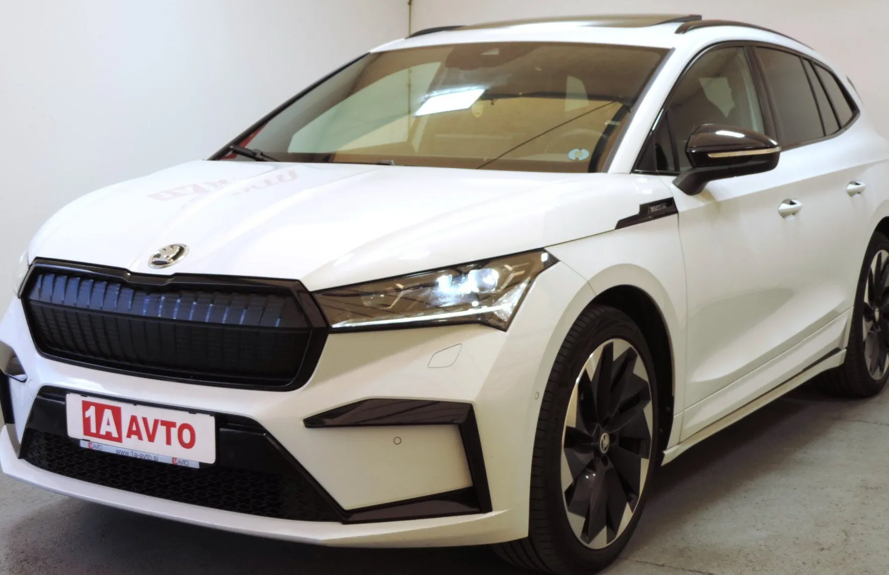 Zunanja slika - Škoda Enyaq - IV 80 Sport Line PANORAMA-ALCANTARA-KAMERA - 1