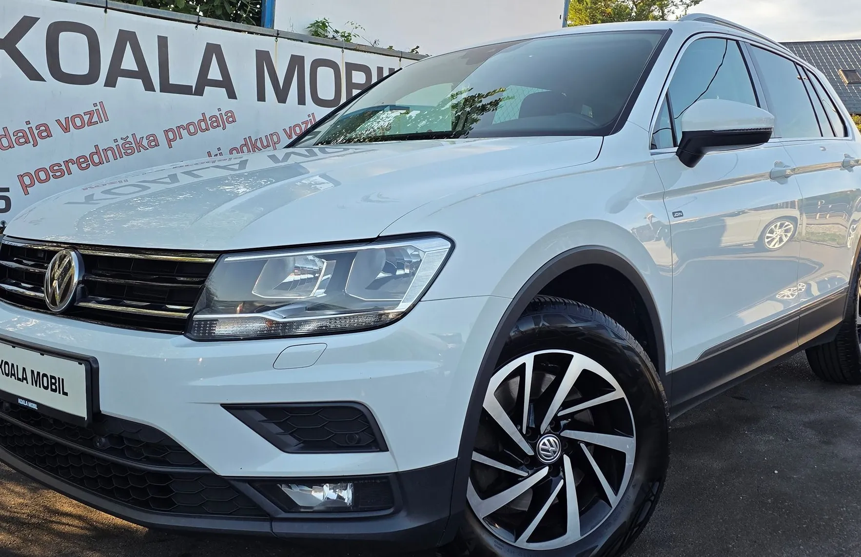 Zunanja slika - Volkswagen Tiguan - 2.0 TDI BMT DSG 4MOTION ALU-NAVI-GRETJE SŽ-1.LAST - 1