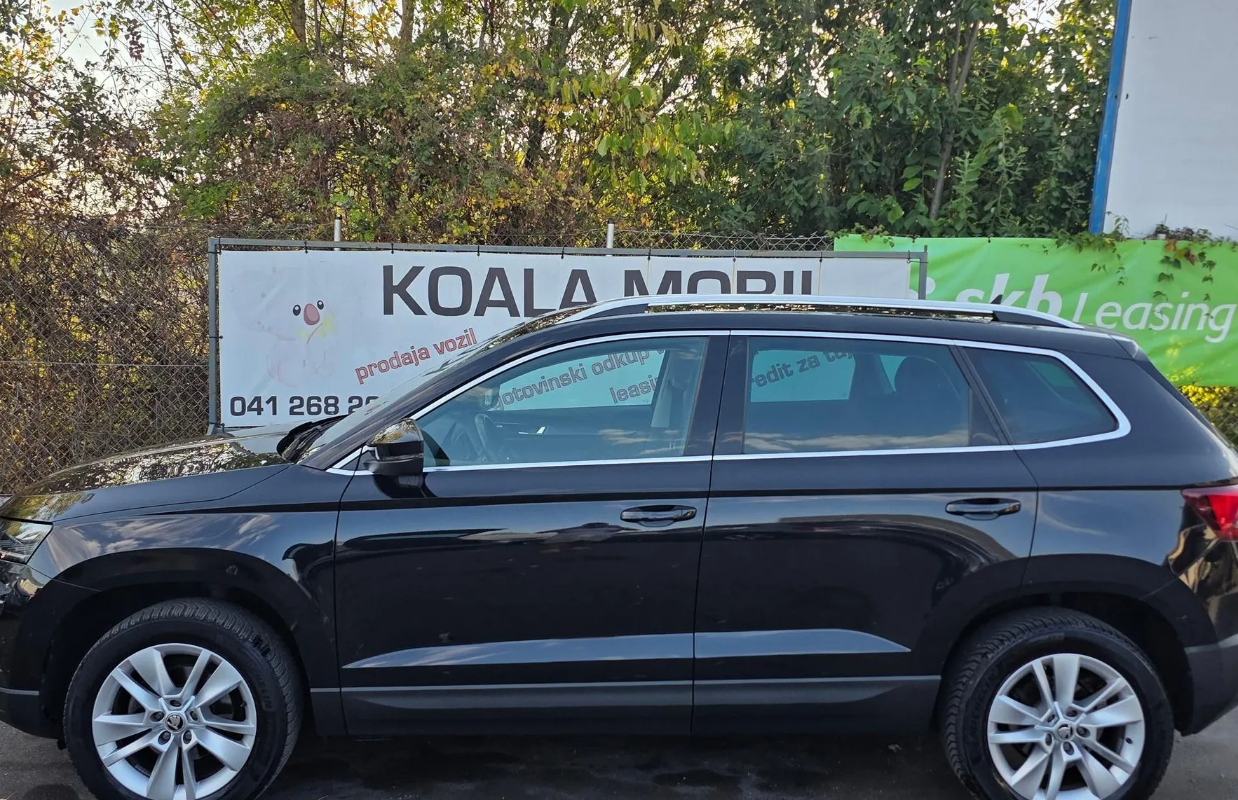 Zunanja slika - Škoda Karoq - 1.0 TSI STYLE LED-VIRTUAL-KAMERA-GRETJE SEDEŽEV - 7