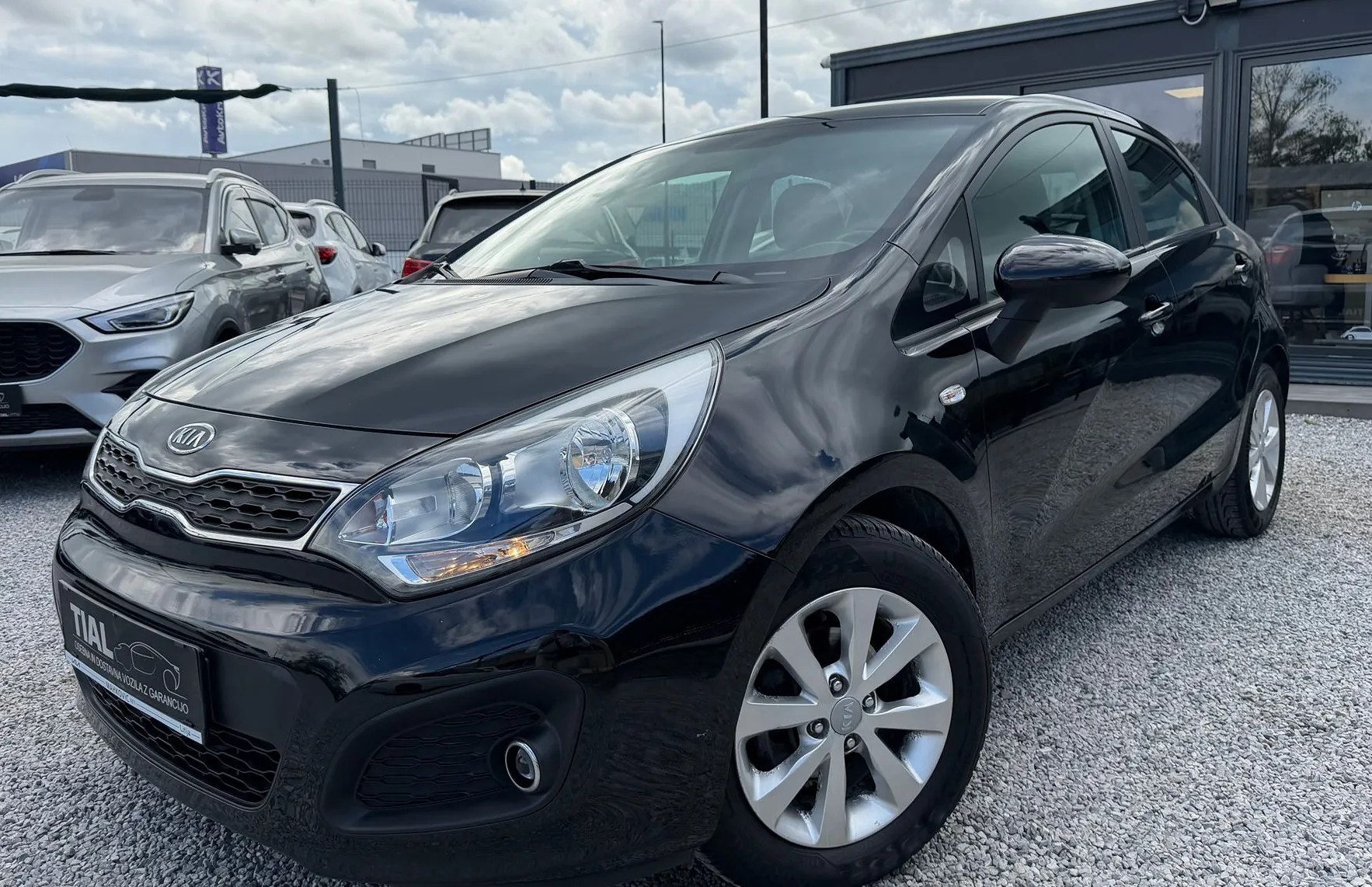 Zunanja slika - KIA Rio - 1.2 SAMO 78.000KM-AVT.KLIMA-PDC-SLO-NA OBROKE - 1