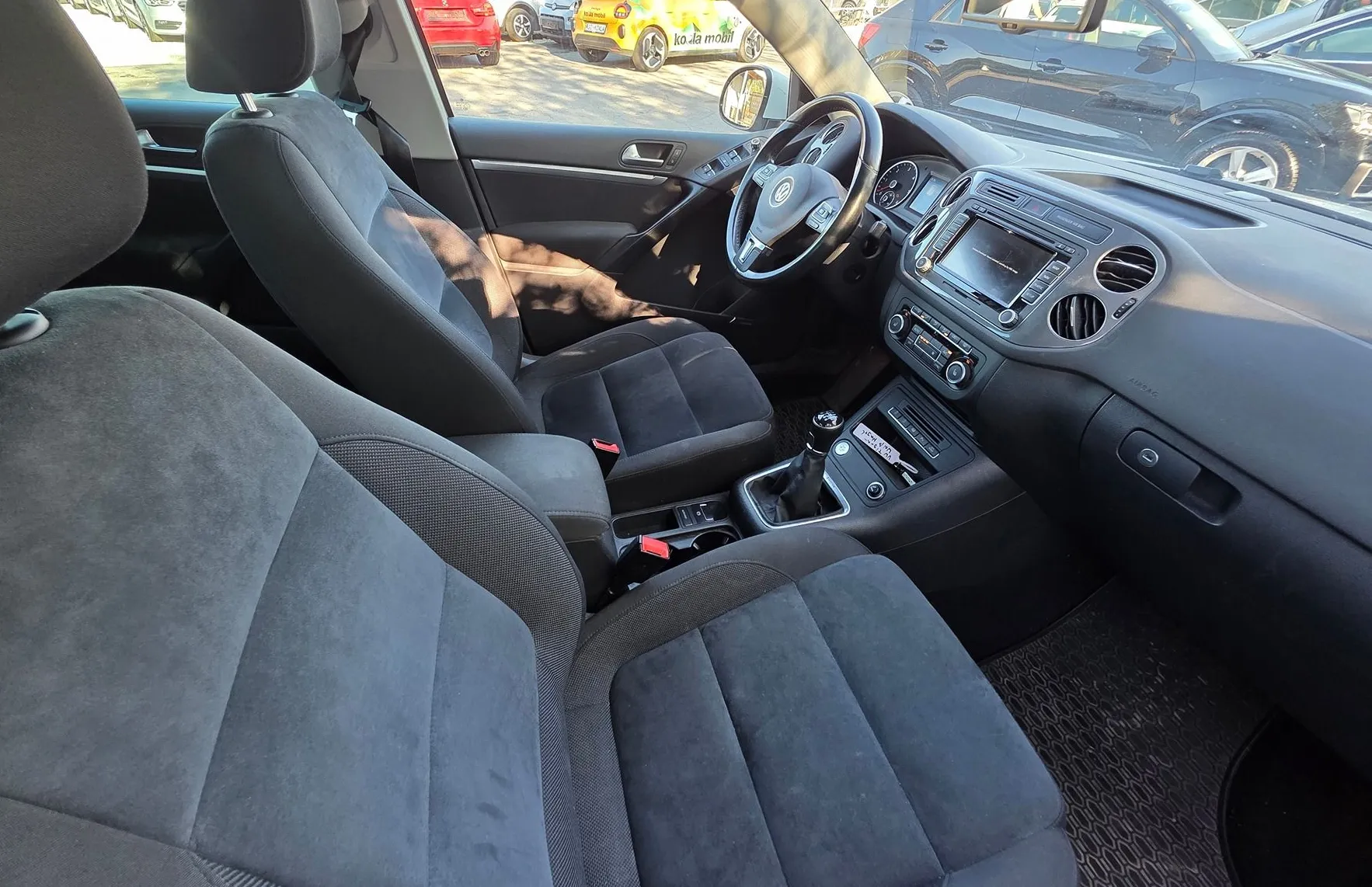 Zunanja slika - Volkswagen Tiguan - 2.0TDI 4MOTION BI-XENON-NAVI-ALU-KEYLESS-1.LASTNIK - 11