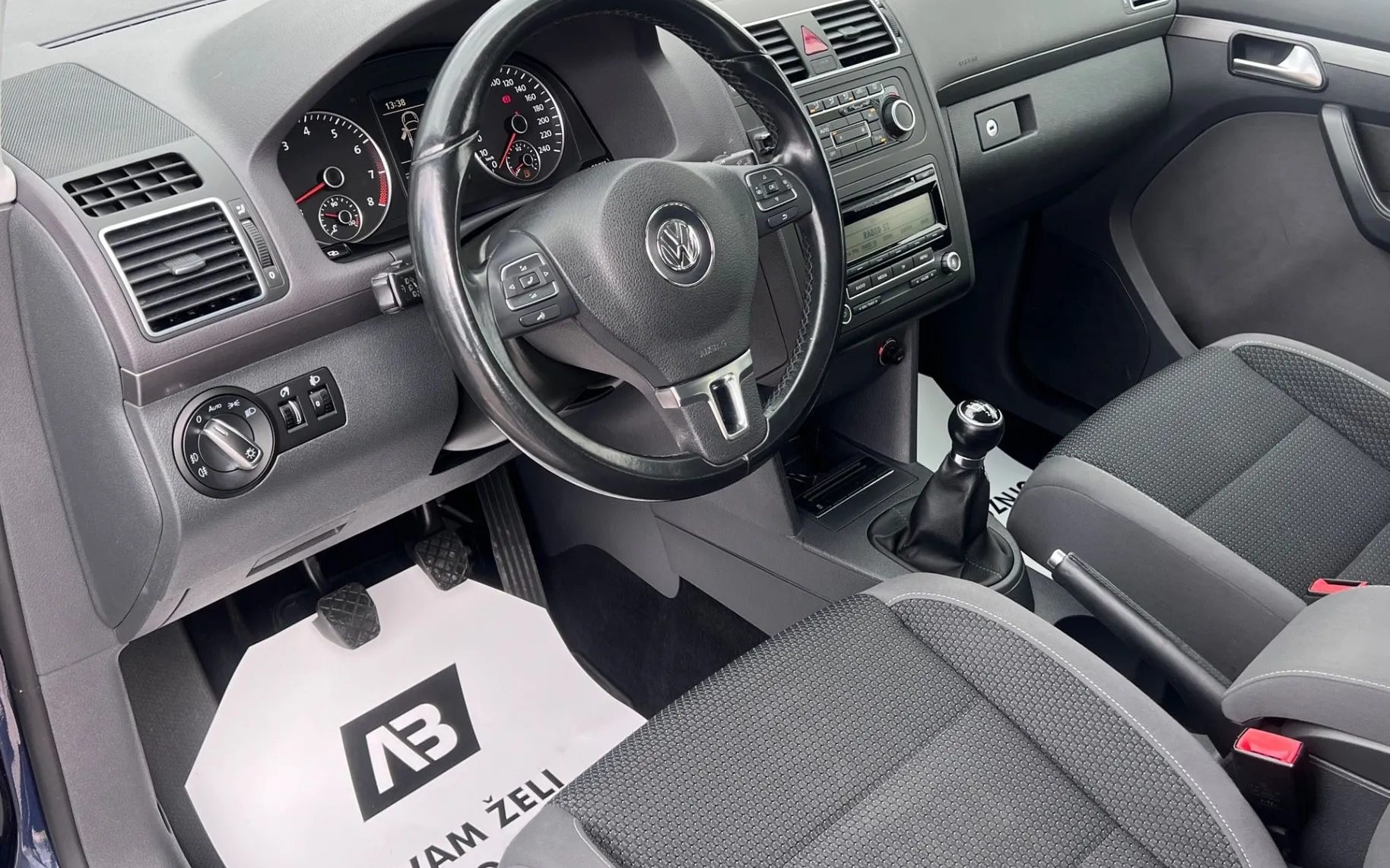 Notranja slika - Volkswagen Touran - 1.2 TSI Comfortline+PDC+TEPM+BLUETOOT - 10