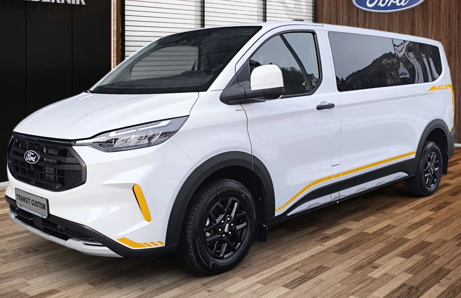 Zunanja slika - Ford E-Transit Custom - Transit Custom KOMBI TRAIL 2.0 TDCi 170 KM A8 L2H1 AWD-ZALOGA - 1