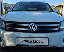 Zunanja slika - Volkswagen Tiguan - 2.0TDI 4MOTION BI-XENON-NAVI-ALU-KEYLESS-1.LASTNIK - 2 - Predogledna slika