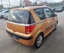 Zunanja slika - Peugeot 1007 - Style 1.4 98964 KM. AVT.KLIMA.2XEL. DRSNA VRATA - 6 - Predogledna slika