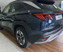 Zunanja slika - Hyundai Tucson - 1.6 T-GDI PREMIUM BLUE-SVETL.NOTR-AVT.PRTLJ-VIDEO - 4 - Predogledna slika