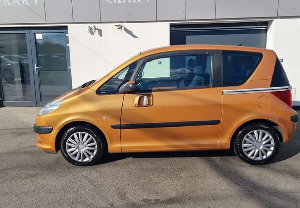 Zunanja slika - Peugeot 1007 - Style 1.4 98964 KM, AVT.KLIMA,2XEL. DRSNA VRATA - 1