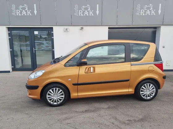 Zunanja slika - Peugeot 1007 - Style 1.4 98964 KM. AVT.KLIMA.2XEL. DRSNA VRATA - 1